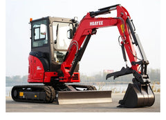 IronPeak Titan 3500 on the jobsite with hydraulic thumb and swing boom