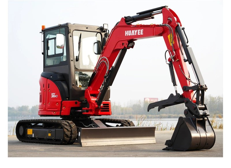 IronPeak Titan 3500 on the jobsite with hydraulic thumb and swing boom
